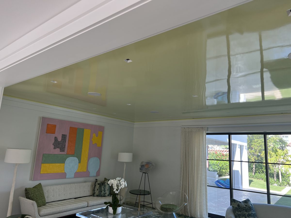 Luxury living room with high-gloss painted ceiling